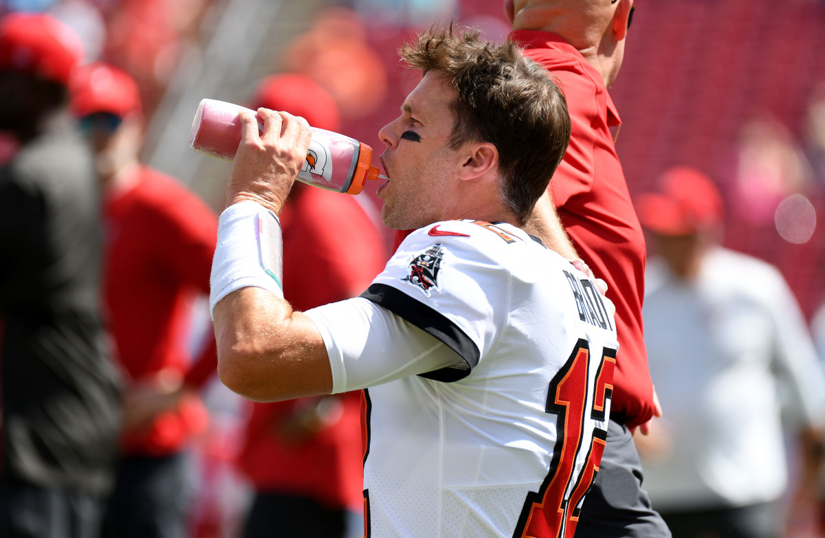 Oct 10, 2021; Tampa, Florida, USA; Tampa Bay Buccaneers quarterback Tom Brady (12) on the field before the start of the game against the Miami Dolphins at Raymond James Stadium. Mandatory Credit: Jonathan Dyer-USA TODAY Sports
